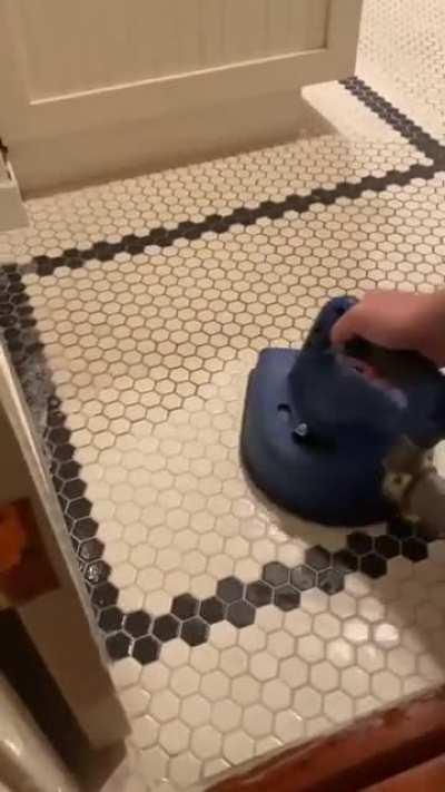 Cleaning up dirty tiles. credit - truecleanfc