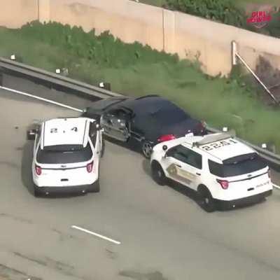 Truck driver helps police to stop the car they were chasing and then is on its way