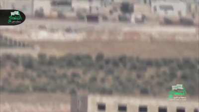 Opposition BGM-71 TOW strike on a Syrian Army tank peeking from over a berm - Aleppo Countryside - 8/5/2014