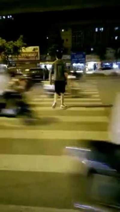 How to cross a road in HCMC or Hanoi