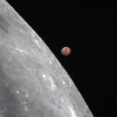 Mars passing behind the Moon