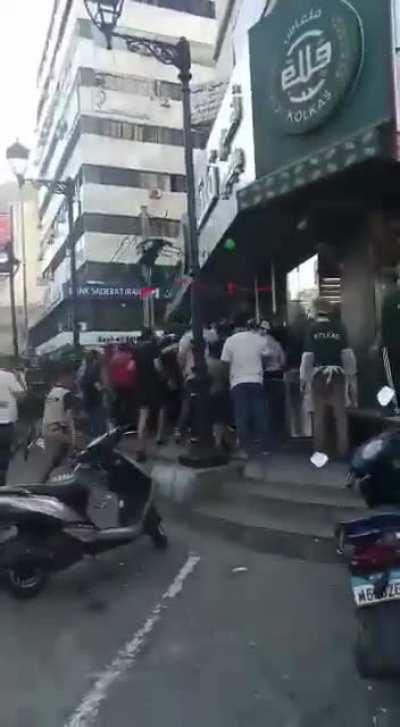 People pushing and fighting each other over pieces of bread in Dahye just a few days after the elections ended. Guess who they voted for?