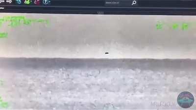 This is the video Jeremy Corbell wanted to obtain a HD version of which shows a UFO coming out of the water.