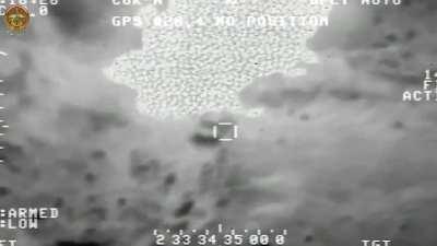 Iraqi Air Force bombs isis front loader, group of combatants and one of their tanks later in series of air strikes in Anbar and Baiji,2015.