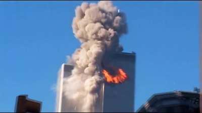 One of the only known video of the North Tower being hit by Flight 11. [HD]