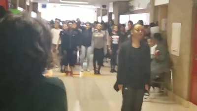 Teacher teaches students to dance Thriller