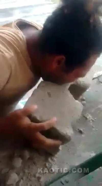 Biting a cinder block