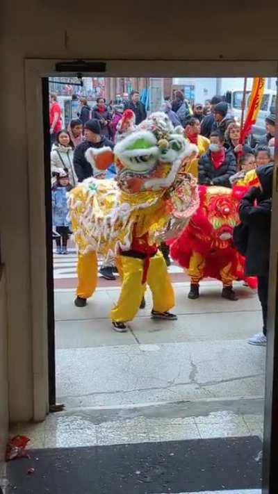 Tourist thinks a Chinese New Year ceremony is all about her