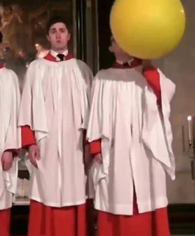 Choir boy uses helium to reach the high notes