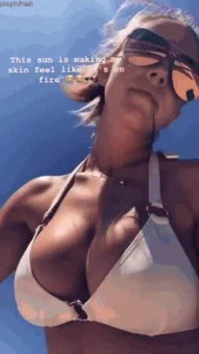 The sun is making her tits look fucking perfect.
