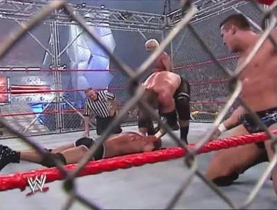 Triple H attempts a pedigree on Goldberg