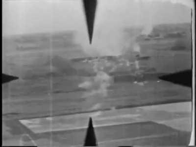 Various shots from a raid on a Japanese airfield in Bangkok on 15 March 1945. Includes voiceover from the owner of the film. 