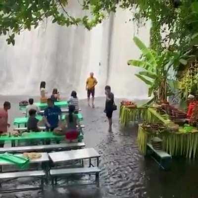 A restaurant at the foot of a waterfall in the Philippines