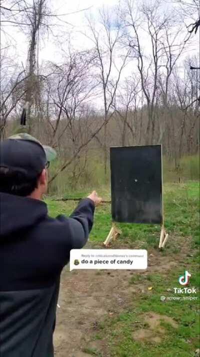 This guy hitting a peice of candy with ab arrow