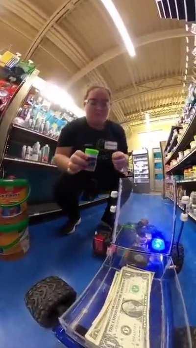 Exchanging shark food with a remote control car.