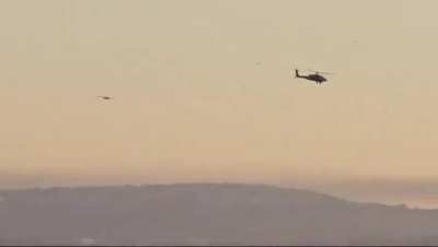 The moment a Hezbollah kamikaze drone passes an IDF AH-64 Apache attack helicopter, after this the siren starts sounding [19.10.2024]