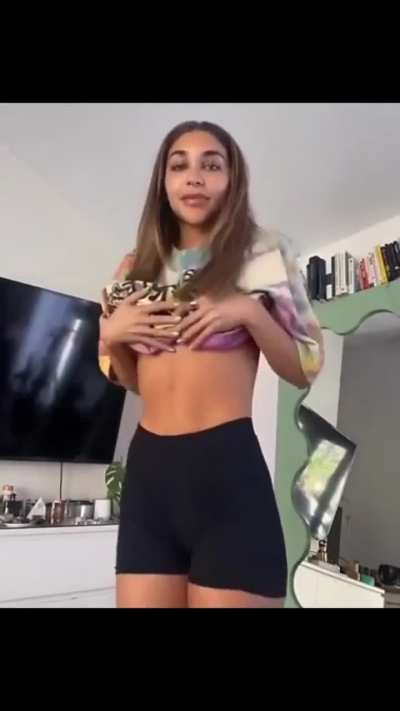 She loves lifting her shirt