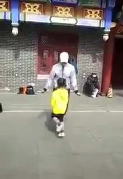 Mother and daughter jump rope in perfect sync