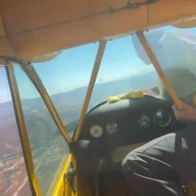 After engine failure the pilot turns the propeller by hand