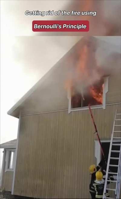 Firefighter putting out a fire using Bernoulli's principle