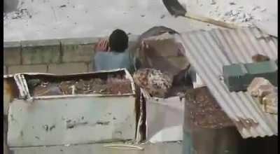 Soldier gets shot trough stomach while walking on rooftop, another man tries to save him but he is shot as well (nsfw)