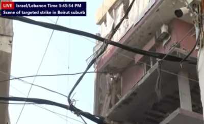 A residential building whose top two floors were hit by an Israeli strike in Beirut's southern suburbs on September 24, 2024.