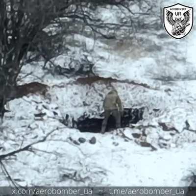 Aerobomber UA drone surveils two Russians entering a fighting position before bombing them. One soldier sees the bombs coming and escapes while his comrade is not so lucky. February 2024.