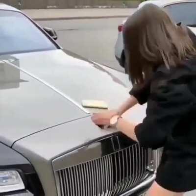 WCGR putting a coffe cup on the bonnet of a Rolls Royce?