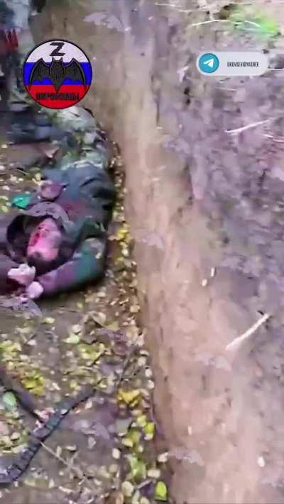 footage shows russian soldiers showing the casualties among the ukrainians after an assault.  