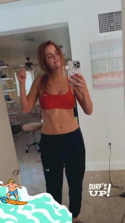 In her red sports bra