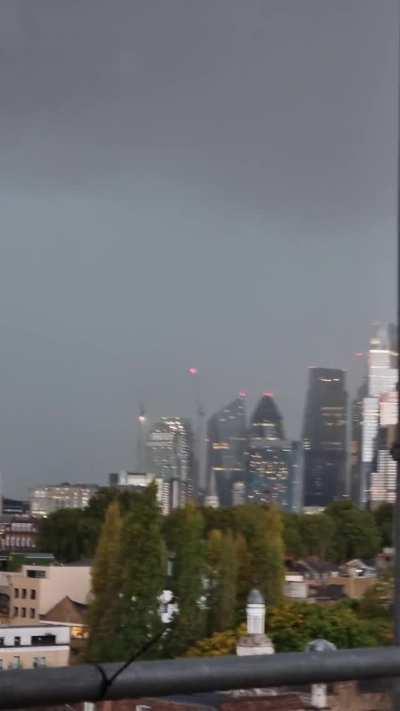 The city disappearing behind yesterday's wall of rain