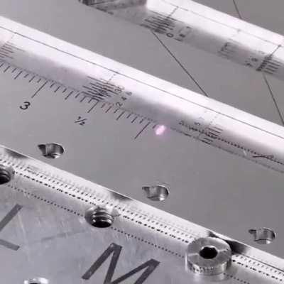 Laser engraving a ruler.