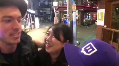 The Woman wearing Black was being followed by a Creep, she noticed a Twitch streamer and pretended to be his friend.