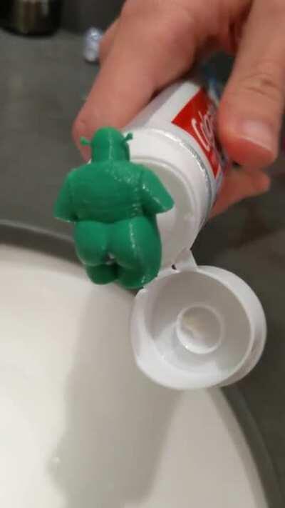 Blursed Shrek pooping toothpaste