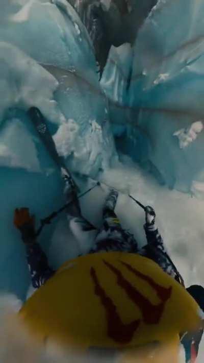 French skier falls down huge hidden crevasse in the French Alps.