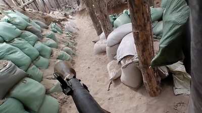 Brazilian Volunteer fires RPG towards Russian positions. Serebryansky forest. Luhansk Oblast. September 2024.