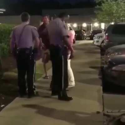 Karen escalates after parking lot confrontation with lesbian veterans.