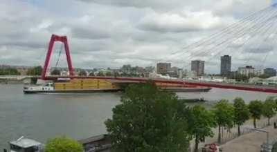 River cargo ship crashes against bridge and loses load - 1 July 2020, Rotterdam, Netherlands