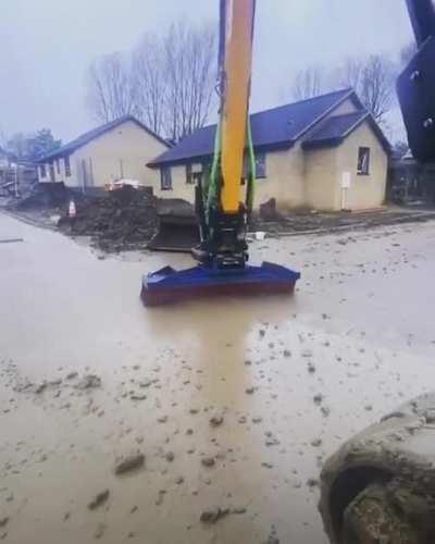 Cleaning the road with a giant brush!