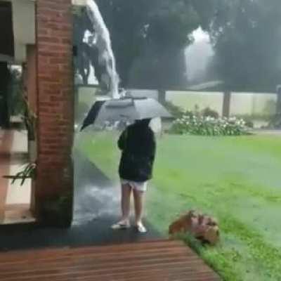 In the rain with a metal umbrella, WCGW?