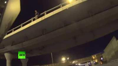 Biker prevents a guy from suicide on highway