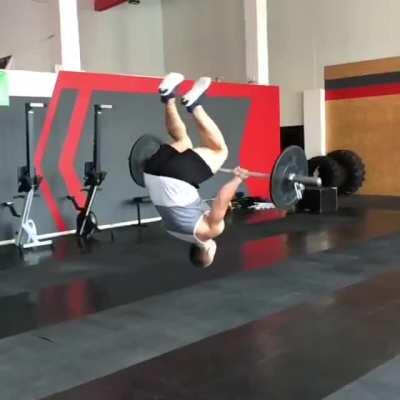 Doing a backflip with weights (I think it belongs here)