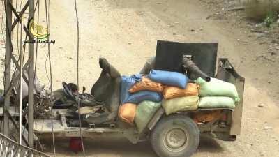 Shuda al-Islam Brigade attach a BMP-1 recoilless cannon to a converted SUV and engage Syrian Army targets - June 2014