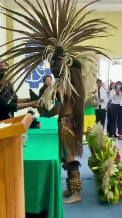 Engineering student decided to receive his degree with ceremonial indigenous attire.