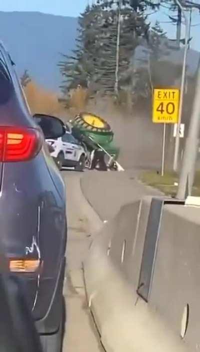 RCMP flip trackor on highway