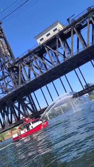 PDX Fire power washing the Broadway Bridge