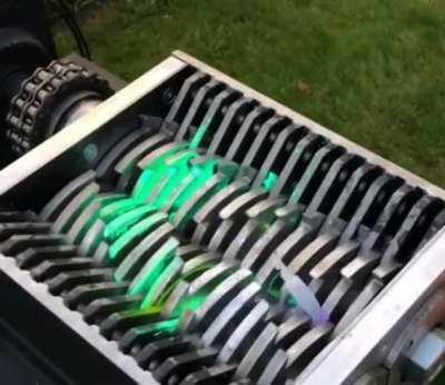 Extremely satisfying : Dropping glow sticks into the shredder