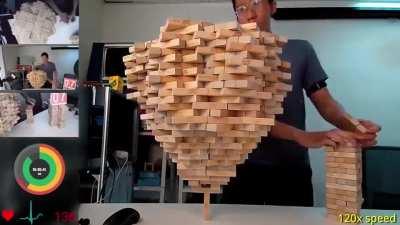 This person building a mind blowing Jenga Tower.