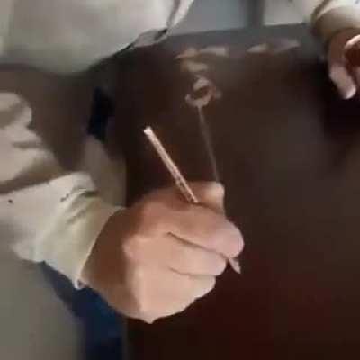 Precision painting on a table.