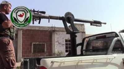 Syrian Opposition attach a homemade anti-material rifle to a pickup truck